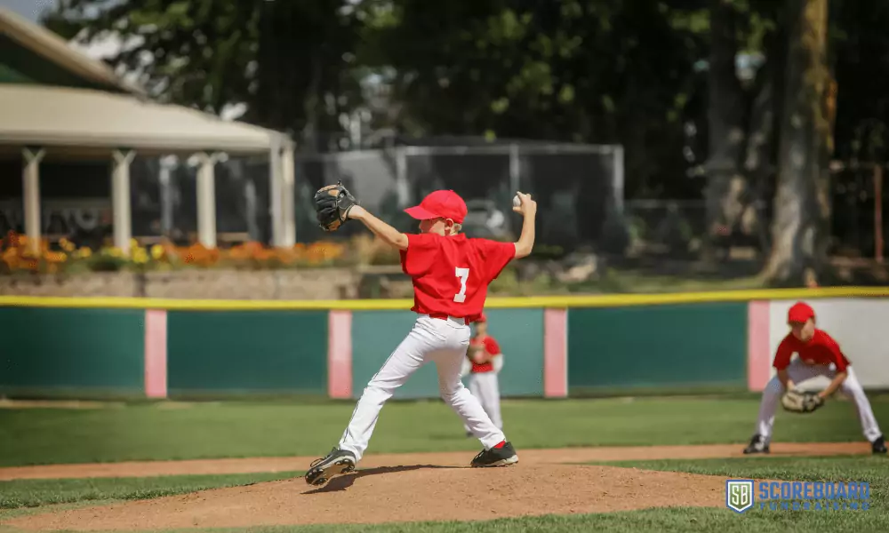 3 Youth playing baseball.